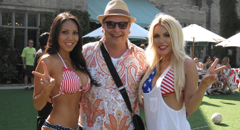 Andrew Hornery, centre, with Miss Playboy Brazil, left, and Crystal Hefner at the Playboy Mansion July 4 party in 2013 (Source: Sydney Morning Herald)
