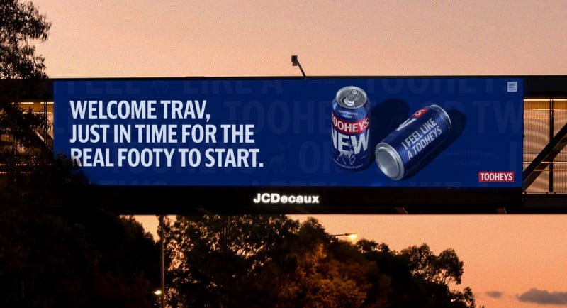 Tooheys out of home billboard by Thinkerbell inviting Travis Kelce to real footys as he touches down in Sydney for Taylor Swift concert